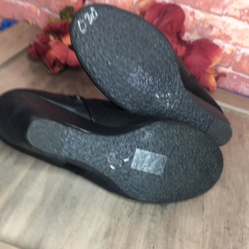 Blowfish’s Malibu Black Slouchy Faux Leather Wedge Ankle Booties